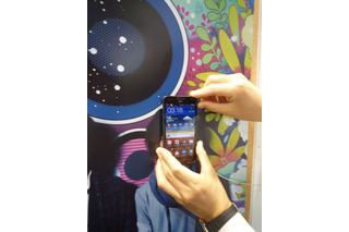 【Wireless Japan 2012】端末をかざすだけ！ その場で大容量コンテンツを再生……NFC×Wi-Fi連携システム 画像