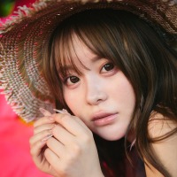 花を手にしたさくら