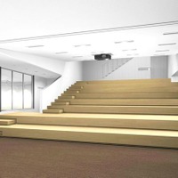 【2F サクセス・ホール】　講演会や特別授業など様々なイベントを開催する多目的ホール。階段状のオープンな作りで、200インチの巨大スクリーンも備えている