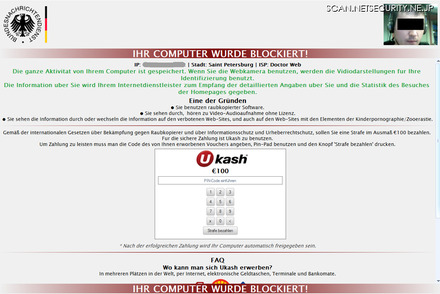 感染したPCに表示されるWindowsのブロックに関するテキストおよび画像。右上にWebカメラ画像がある
